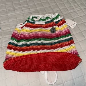 The Sak Crochet Craze drawstring backpack purse. New with tags.